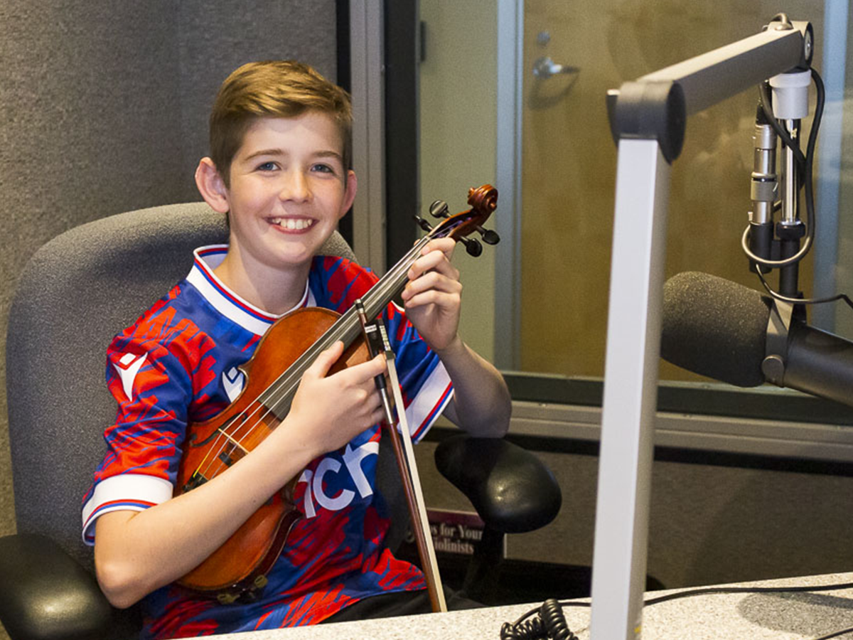 violinist Benny Taylor in the KBACH studios