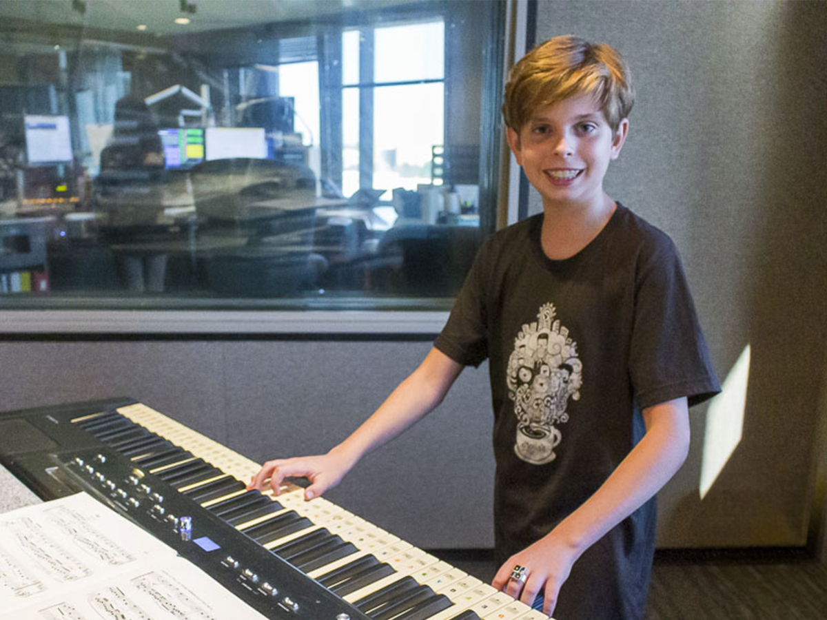 12-year-old pianist, Liam Tucker in the KBACH studios